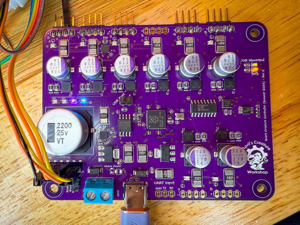 A photo of the August 2024 version of my Creature Controller. Present is hardware to control eight servos, and an on-board RP2040.